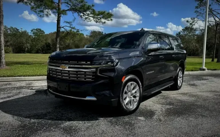 Black Chevrolet Suburban, three-quarter front view
