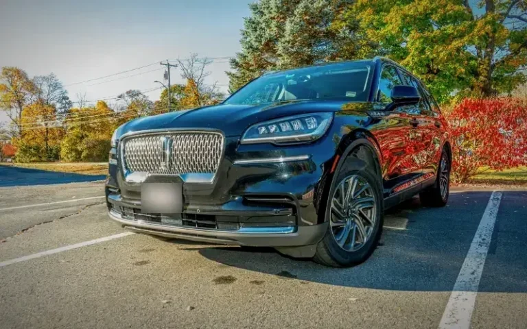 Black Lincoln Navigator, three-quarter front view