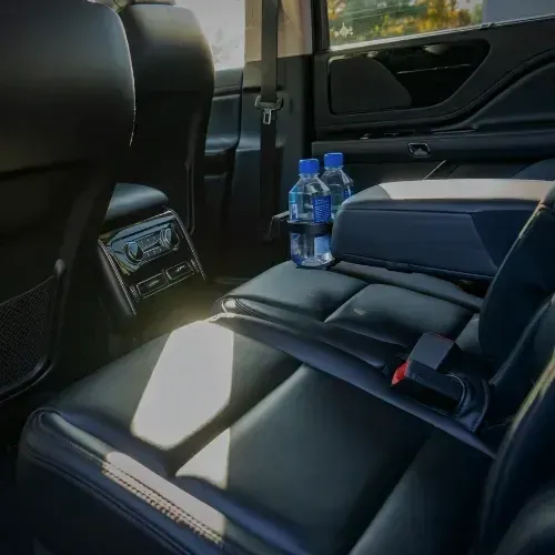 Lincoln Navigator rear seats with bottled water